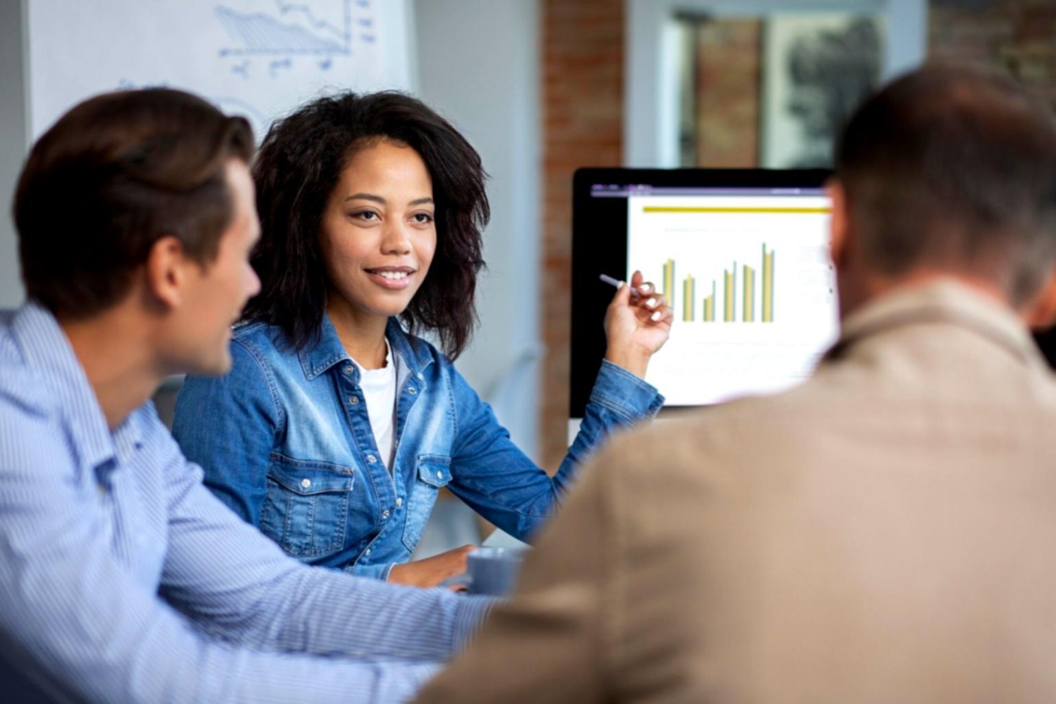 Students engaged in collaborative financial planning workshop